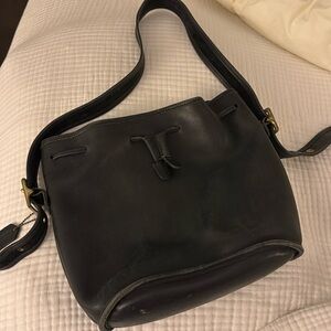 Vintage Coach black leather bucket bag. Light wear but in great condition.